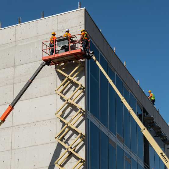 freepik__industrial-aerial-work-platform-working-on-a-build__34369